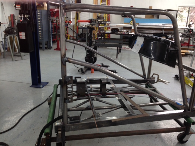 Roll cage starting to take shape.  Checking dash fit to cage.
