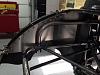 Heat treated aluminum structural panel attaches body to chassis and transfers load from the deck lid spoiler to the chassis.  Also acts as an...
