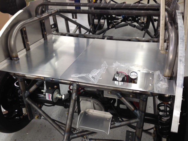 Tin Bending -- adding the tin to the chassis from back to front.  Fuel pump will have an easily removable cover.