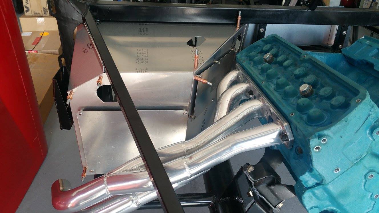 Pass side foot box after heat shields