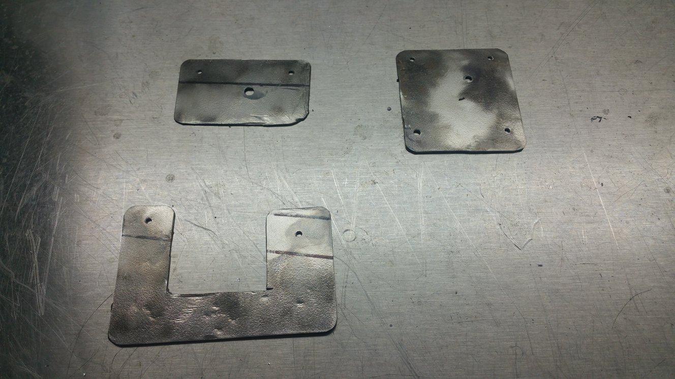Carbon canister and inertia switch brackets   raw