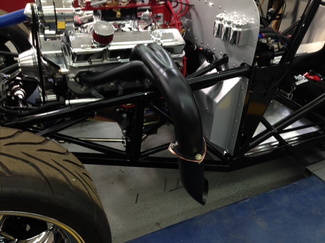 Headers back from the coater and installed with the shorty mufflers.