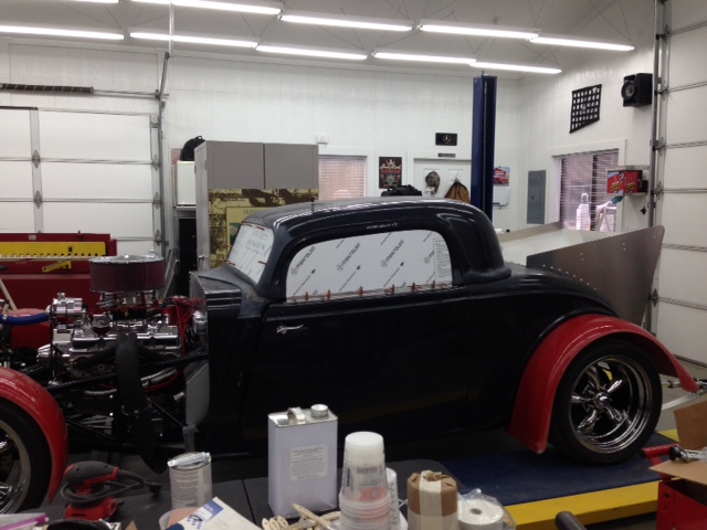 Glass and power window mechanisms add performance robbing weight.  Therefore, I'm adding lightness by using 1/8" polycarbonate instead of glass.

No, it's really not a practical car -- just another adult toy.