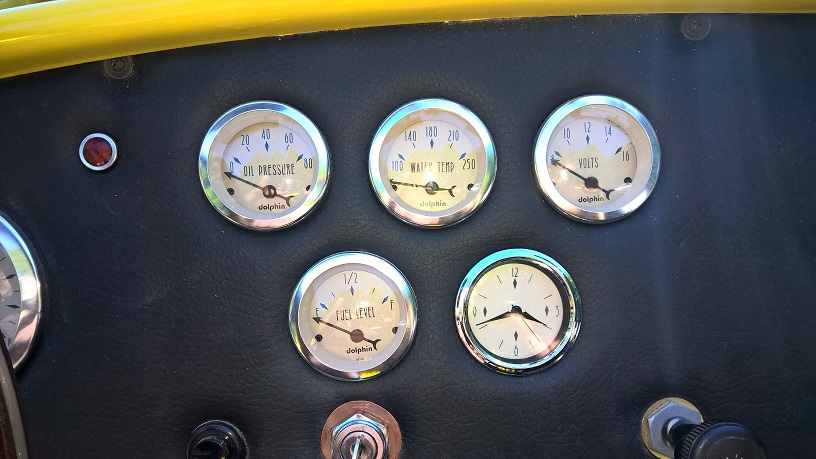gauges, with clock made with ebay mechanism, FF bezel, and face made by my daughter