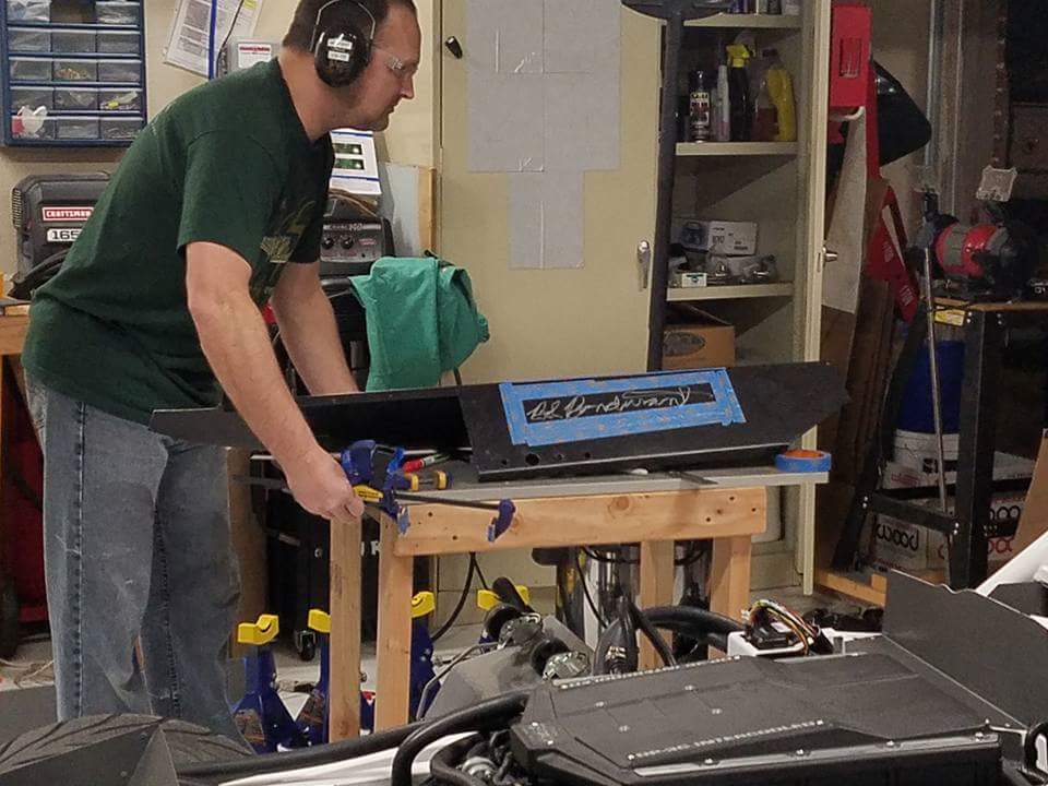 Prepping to cut the signature out.