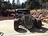 Everything is stripped off the car for the painter.  Did a final fit of the rear fenders with drag slicks on to make sure there would be no...