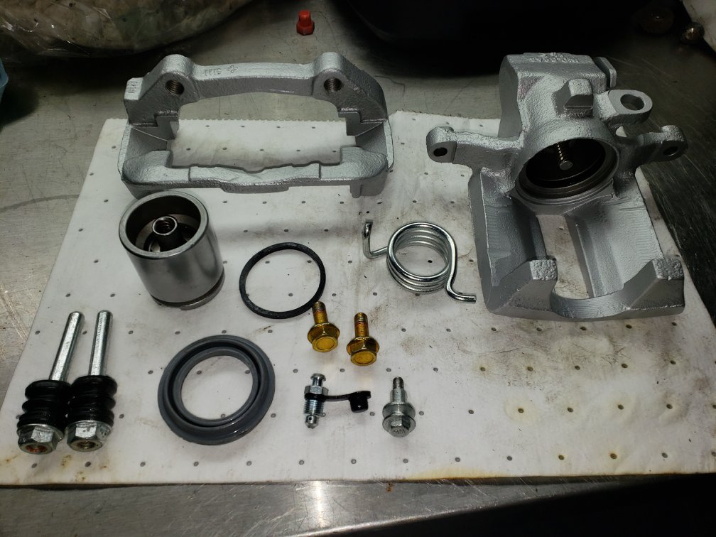 Caliper disassembled