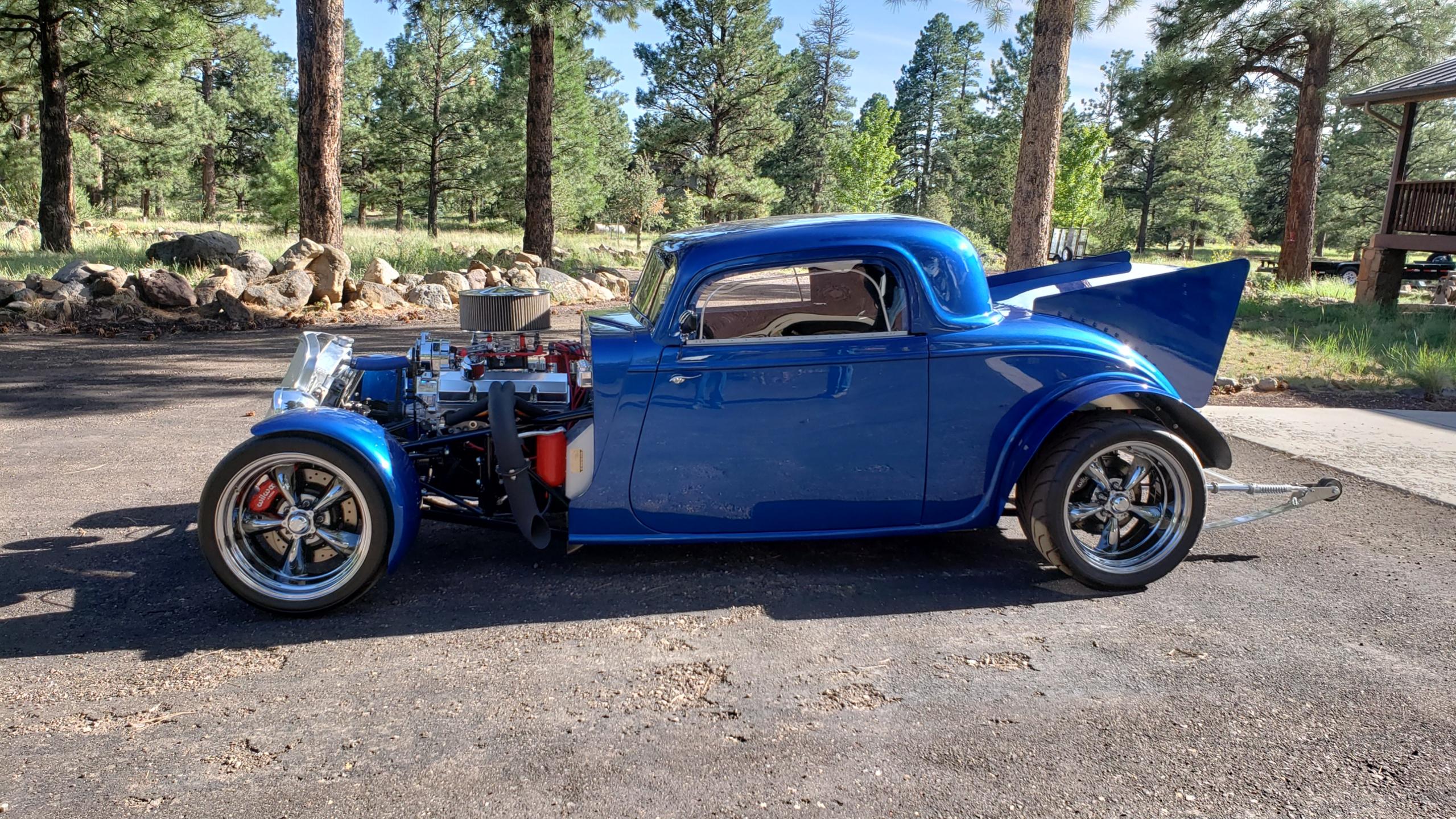Passed the AZ MVD inspection even with the wheelie bars sticking out the back and the plastic windshield and windows (I did remove the slicks).  And absolutely no emission controls not even a PCV -- all natural like back in the day.  However, I was relieved he didn't make me start the thing -- exhaust is loud.  I love Arizona's easy going enforcement.  Got the VIN assigned, sticker placed on the roll cage, title, license plate and registration all in a bit over an hour.  I now have a street legal (barely) nine-second race car.