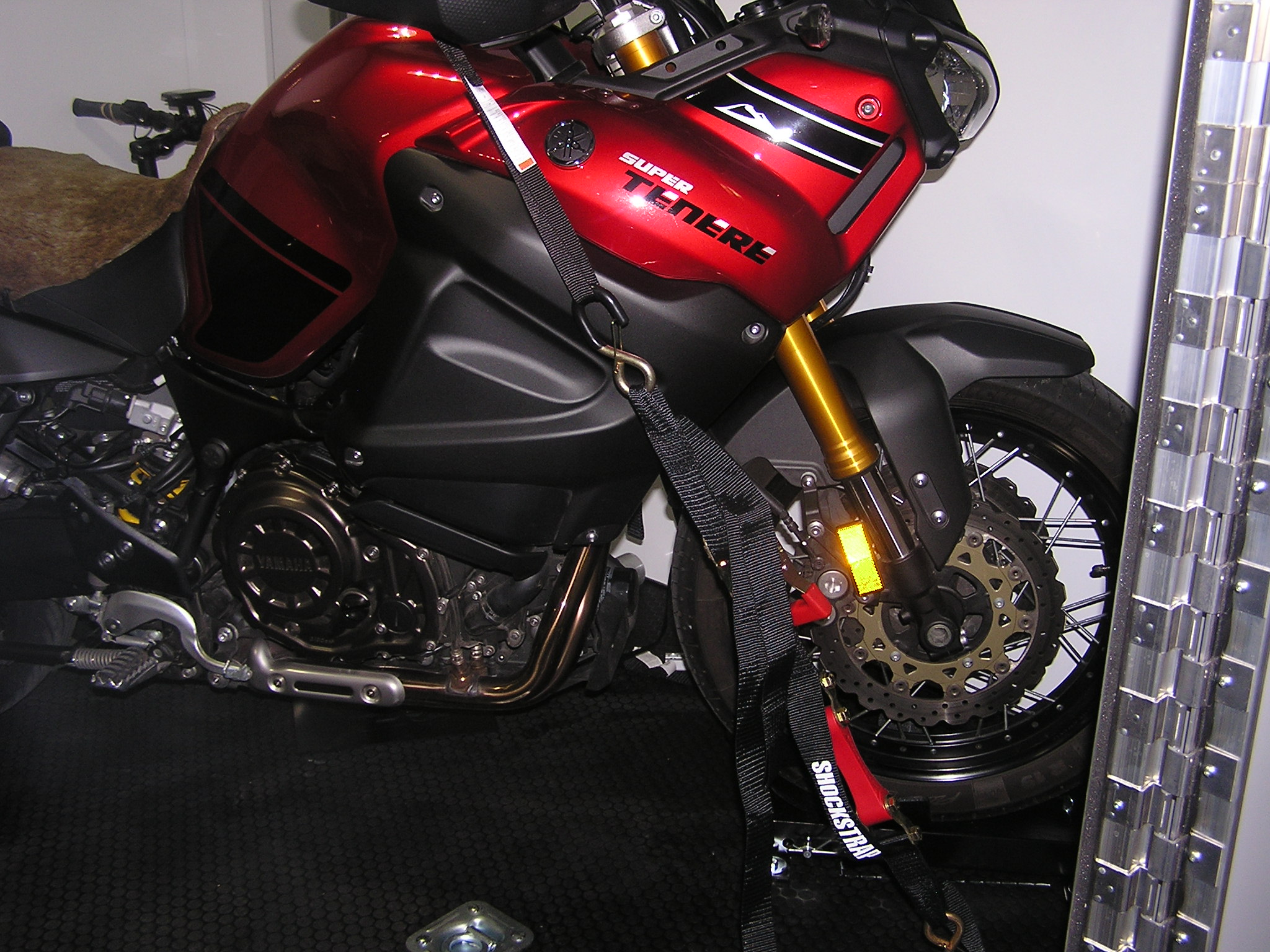 I just picked this up for off highway riding, it fits just fine in the trailer.