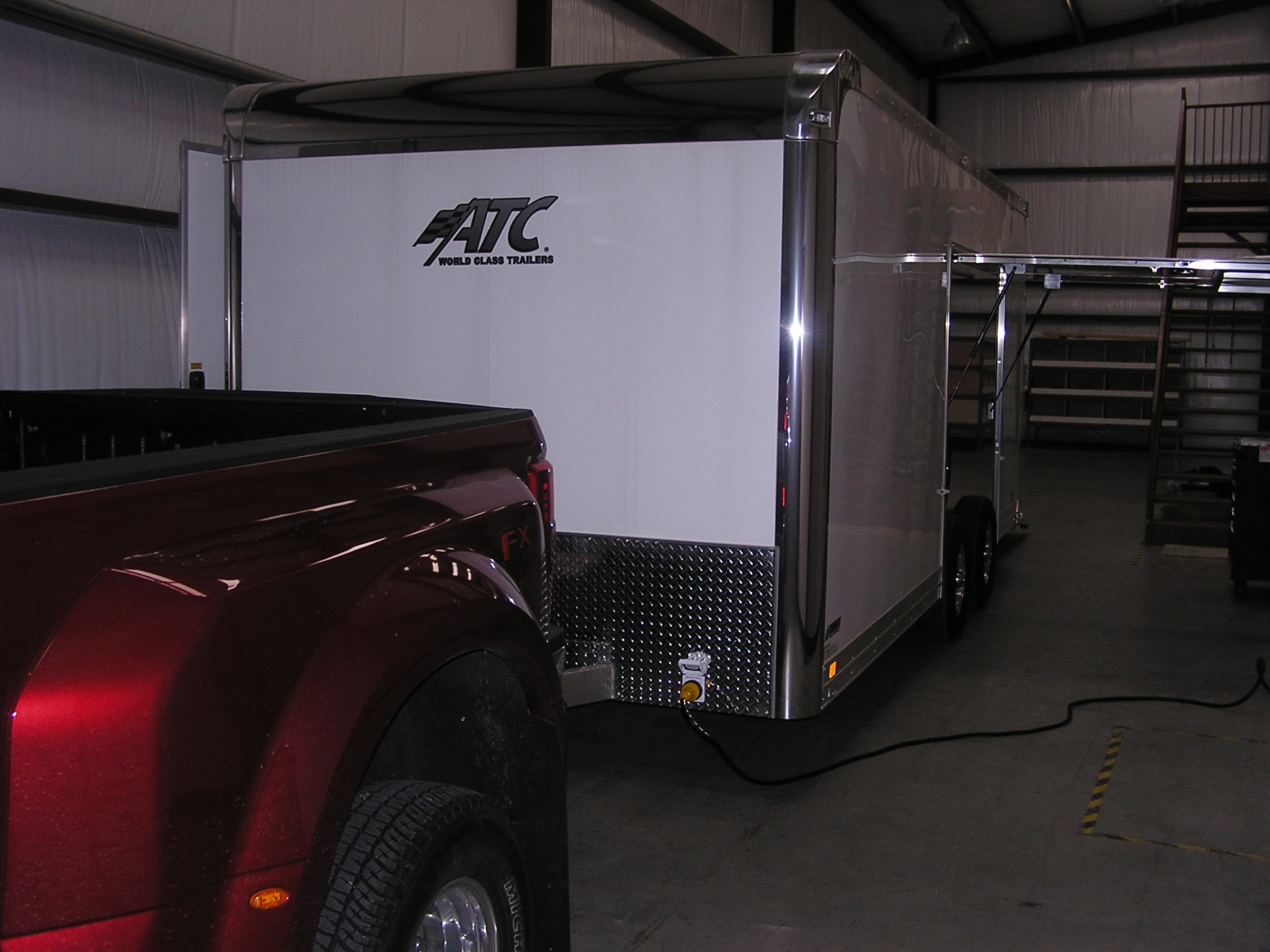 I finally found a trailer enclosed that I think is good value by ATC, this is the Quest model, with nice interior paneling, some cabinets, with side access to the left, to make easy exit from the '33. Without that feature it is almost impossible to clear the wheel well housing without damaging the door paint.