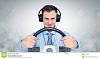 funny man headphones steering wheel car drive concept 59620691