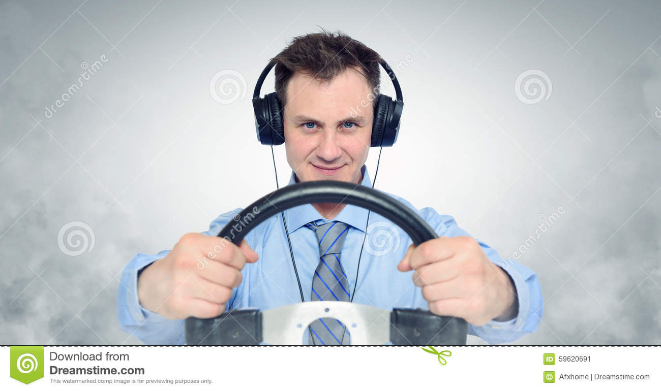 funny man headphones steering wheel car drive concept 59620691