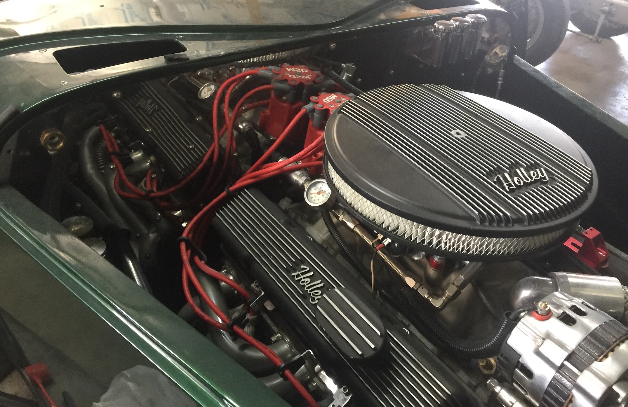 Engine compartment Passenger side, open hood, Fiberglass, Body, and Paint Prep, 121 Rod & Restoration. Finish