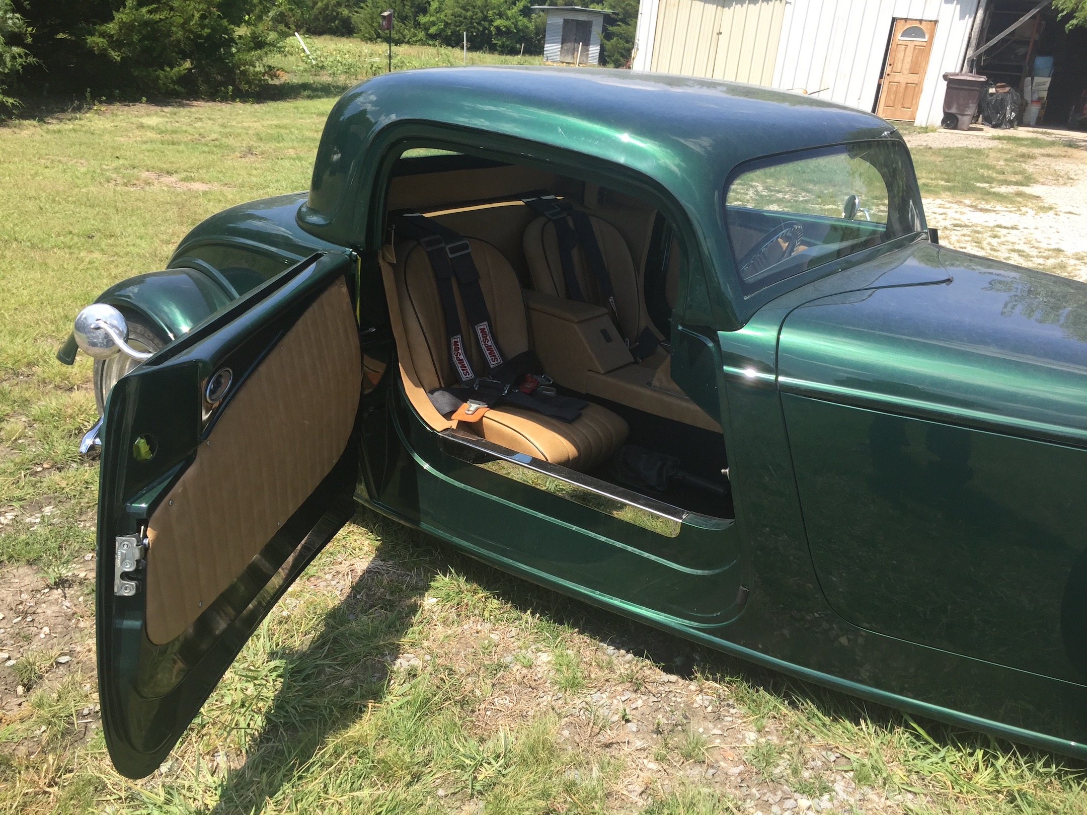 Passenger side, finished interior, open door, Fiberglass, Body, and Paint Prep, 121 Rod & Restoration. Finish