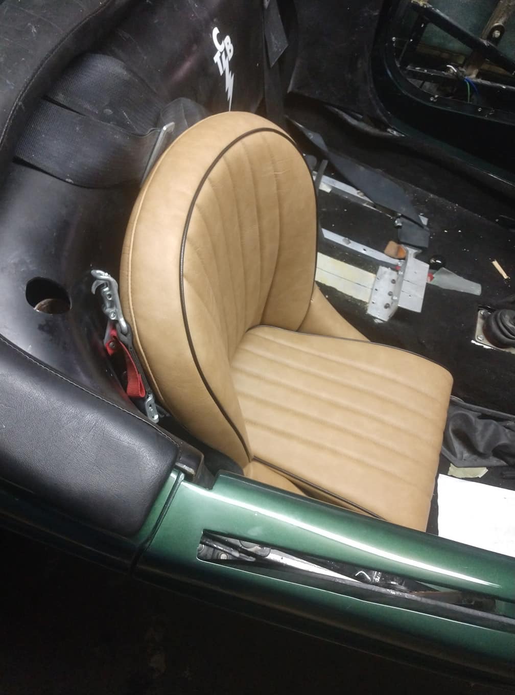 Passenger front seat buckskin cover