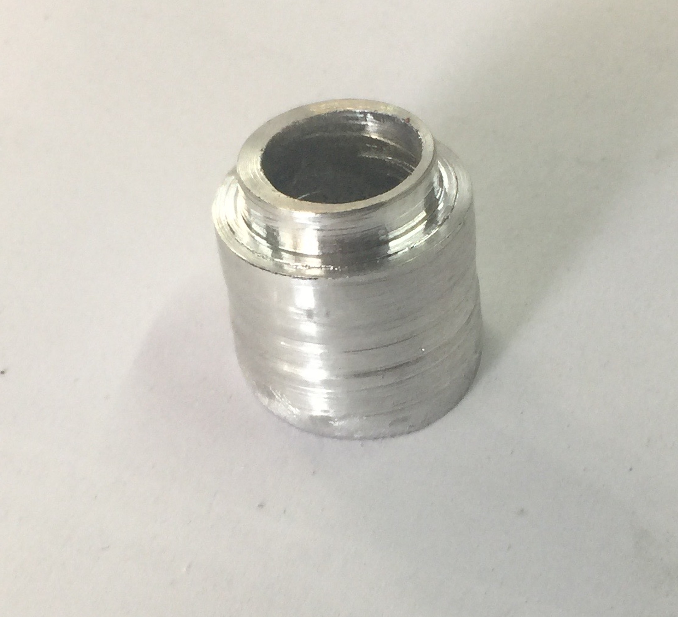 Headlight mount spacer