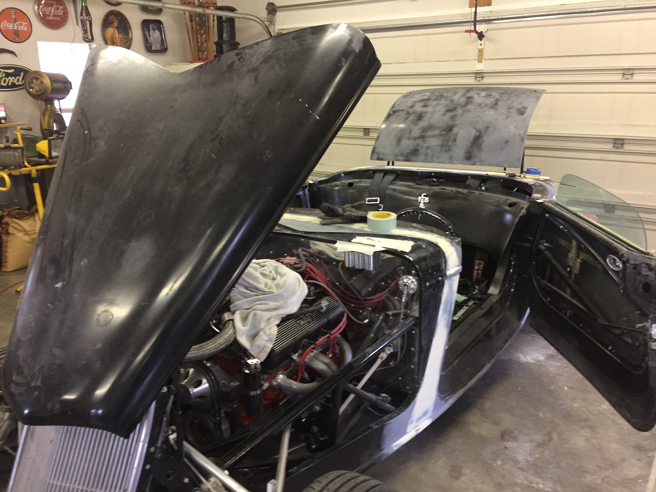 Hood open, fiberglass structural prep.