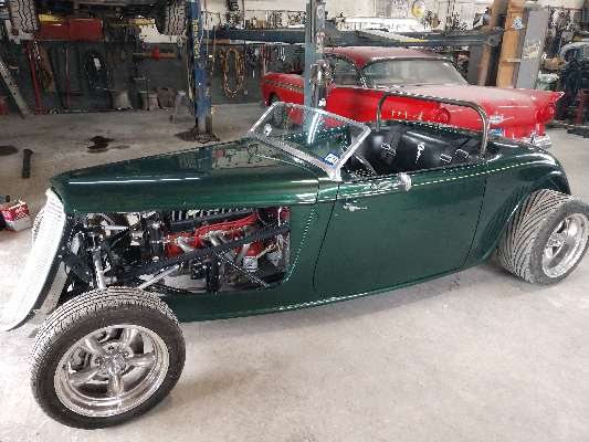 Driver's side, Hood installed without side skirts. Finish