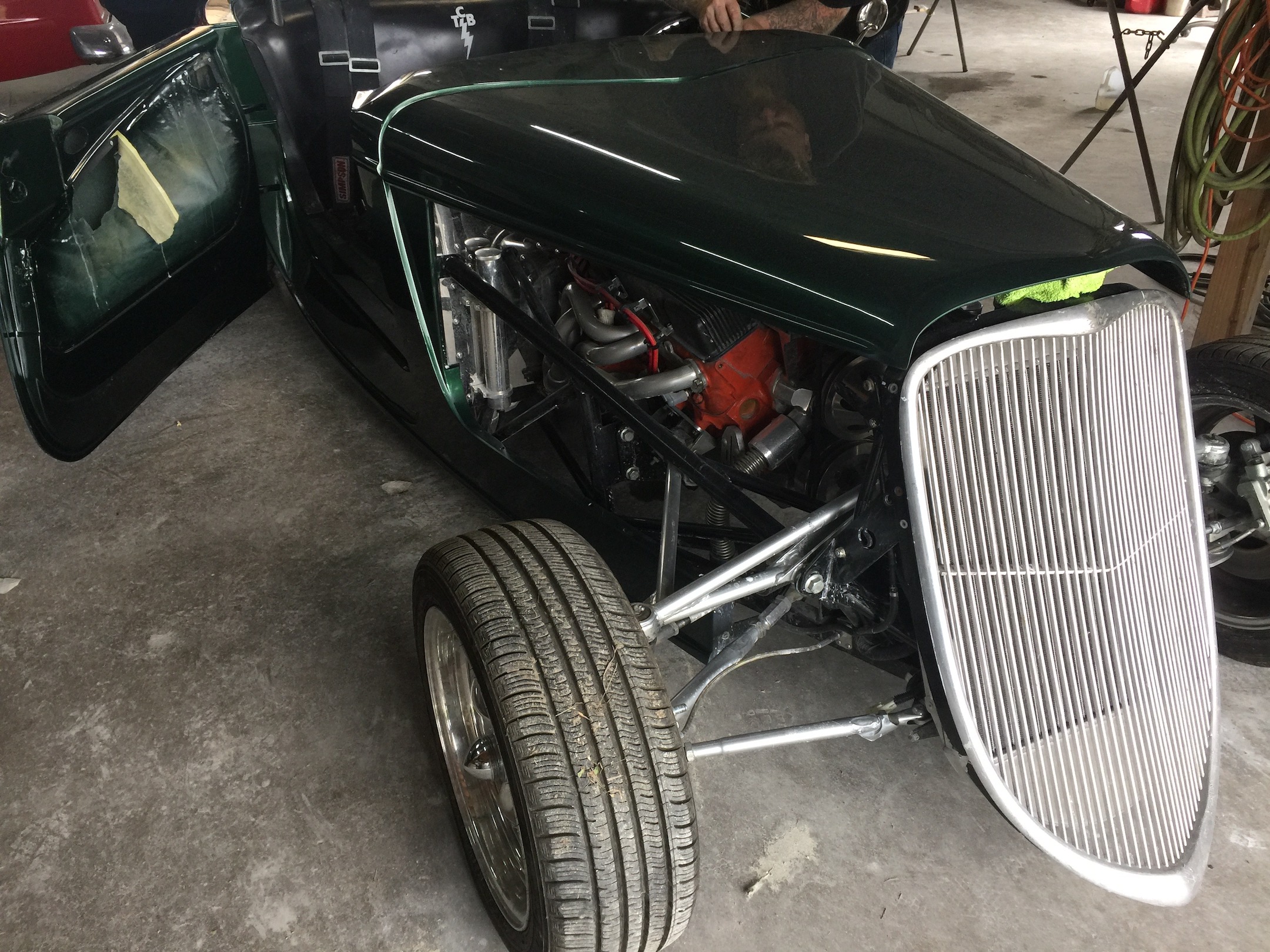 Passenger side front quarter, Engine Compartment, Grill, Fiberglass, Body, and Paint Prep, 121 Rod & Restoration. Finish