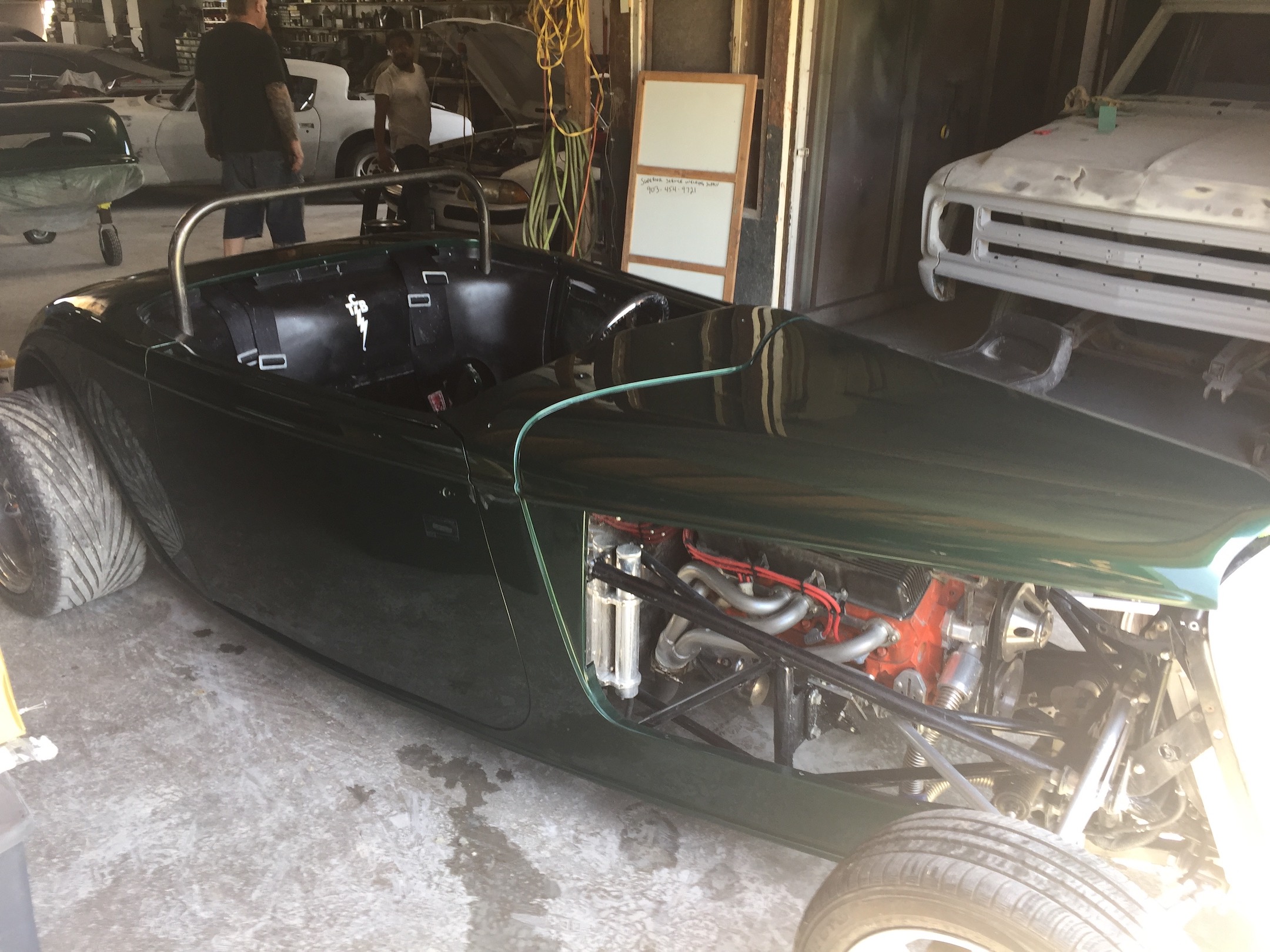 Passenger side, Fiberglass, Body, and Paint Prep, 121 Rod & Restoration. Finish