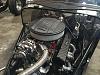 Holley Dress up accessories set off the engine polished firewall.