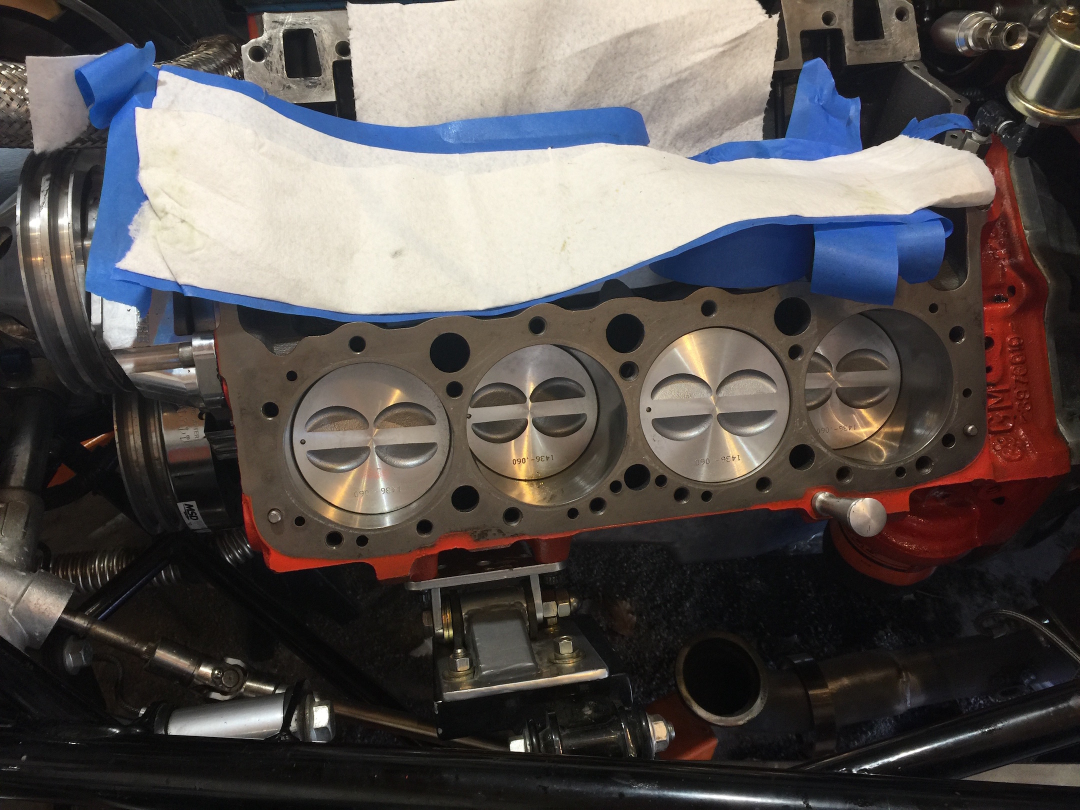 Rebuilt engine in the car waiting on the heads